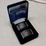 A pair of Sheffield silver napkin rings by Carrs in fitted case