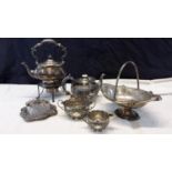 A collection of ornate EP wares to include, butter dish, spirit kettle & swing handle basket