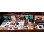 A collection of 45 RPM's & LP records