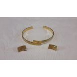 Handmade 9ct gold bangle with diamond centre together with matching 9ct & diamond earrings