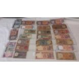 24 Indian banknotes ranging from one Rupee to 100 Rupees