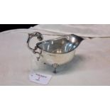 Birmingham silver cream jug on three supporting feet, by Deakin & Francis Ltd, 9x15cm