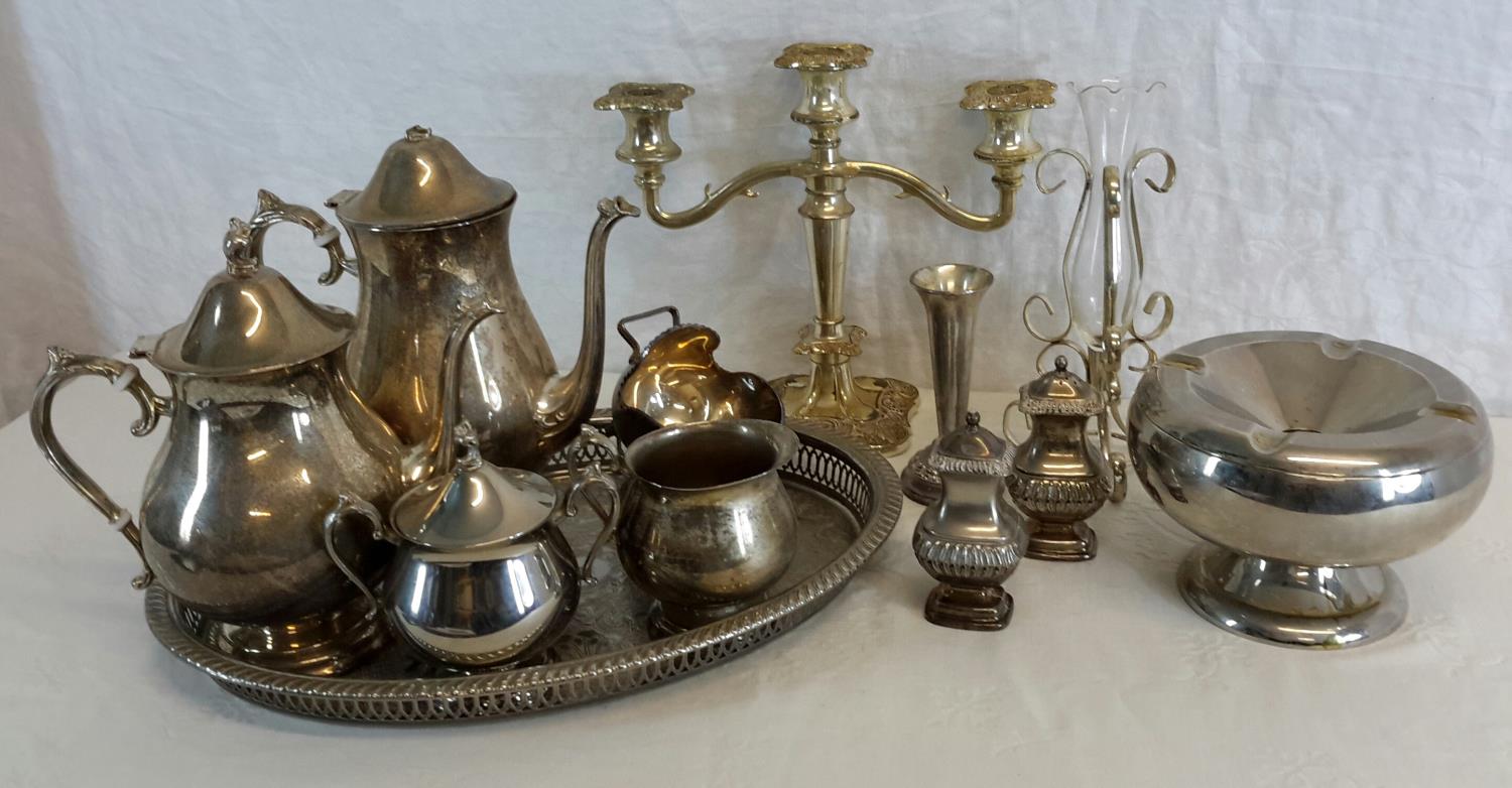 A selection of EP & Silver plated items to include candelabra, tea/ coffee service with a tray &