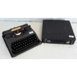 Vintage 'The Baby Empire' typewriter