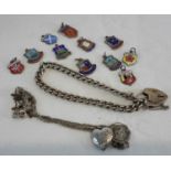 A silver curb bracelet, silver and enamel souvenir charms and 2 other silver items