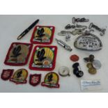 A collection of badges, patches, parker pen with 14ct nib etc