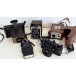 A selection of vintage cameras to include Zeiss Ikon, Polaroid & Praktica etc