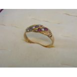 18ct gold ladies dress ring with pearl, blue & red stone setting