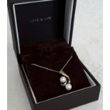 18ct white gold chain with 9ct gold pearl & diamond pendant