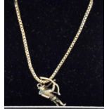 A 9ct gold chain with 9ct gold robin hood pendant