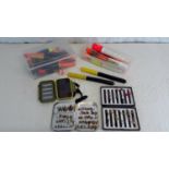 A selection of fishing equipment to include Wheatley fishing tin & flies