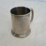 A Birmingham silver single handled mug (inscribed) by Levi & Salaman dated 1903, 7cm in height