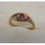 A 18ct gold ladies dress ring with diamond and pink stone setting, has date 1719 stamped on band