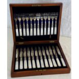 Mother of pearl & silver plated fork & knife set in its fitted wooden box