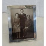 A Birmingham silver photo frame by Martin Hall & Co Ltd, dated 1919. 16 x 12cm