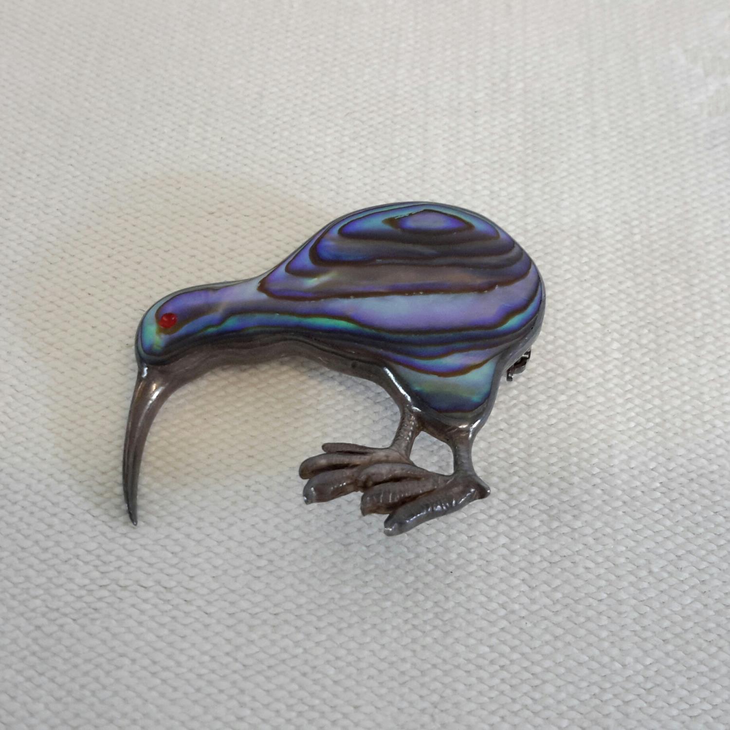 Silver and shell kiwi brooch