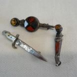 2 silver and agate brooches together with dagger brooch. Longest is 4cm