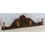 Deer hoof coat hanger