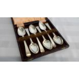 A set of 6 silver hall marked spoons in a fitted box