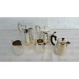 A collection of 5 various EP Tea/Coffee & cream pots