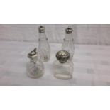 A pair of silver hall marked mounted cruets & 2 silver perfume bottles