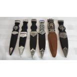 A collection of six sgian dubh with blades & sheathes