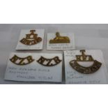 3 various title badges 'Lowland', 'New Zealand Rifle' & 'Royal Field Artillery', together with Black