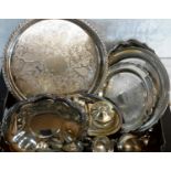 A box full of silver plated serving trays & plates