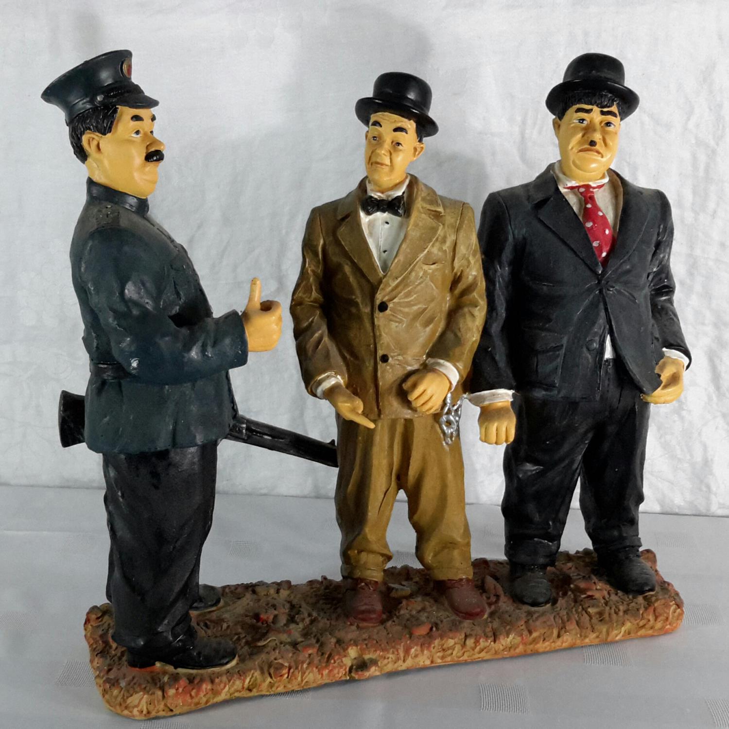 Laurel & Hardy figure with police officer. 34cm in height