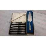 A set of 6 silver handled knives, silver handled cake knife & button hook