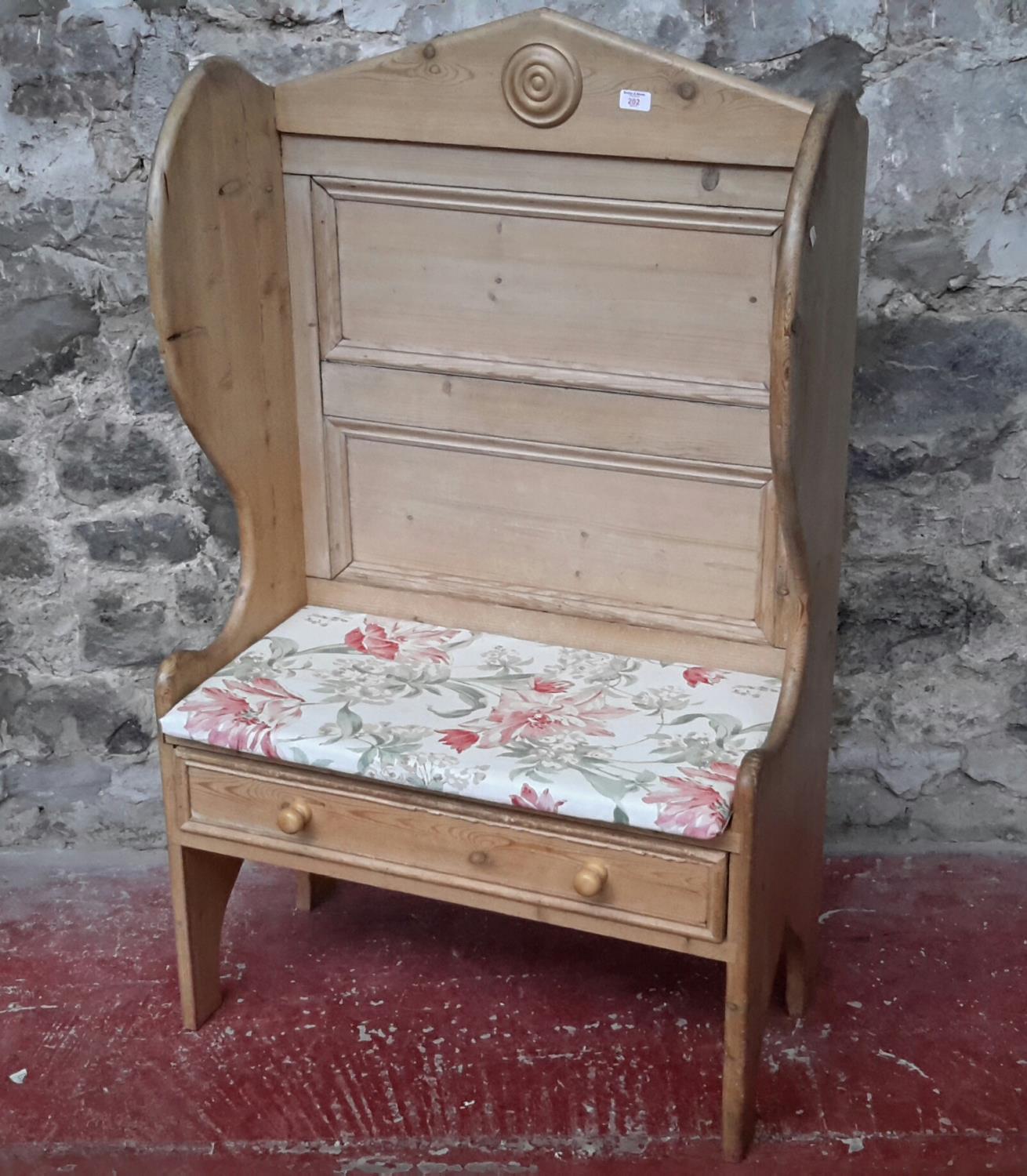 A Pitch pine 2 seat pew with under drawer 131x80x43cm