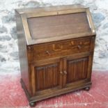 An old charm folded linen design front bureau, 100x76x42cm