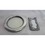 A Birmingham silver photo frame (10cm in diameter) together with Birmingham silver case