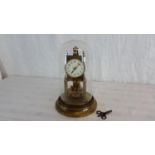 A 1910 Anniversary clock by Gustav Becker stamped on the back Medaile D'or 242267. 29cm in height.