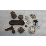 A selection of war dug Nazi relics mixed with various medals