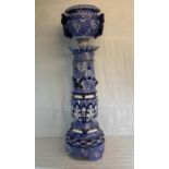 A large Mintons impressed mark 1883 jardiniere & pedestal stand with blue & white ribbon design.