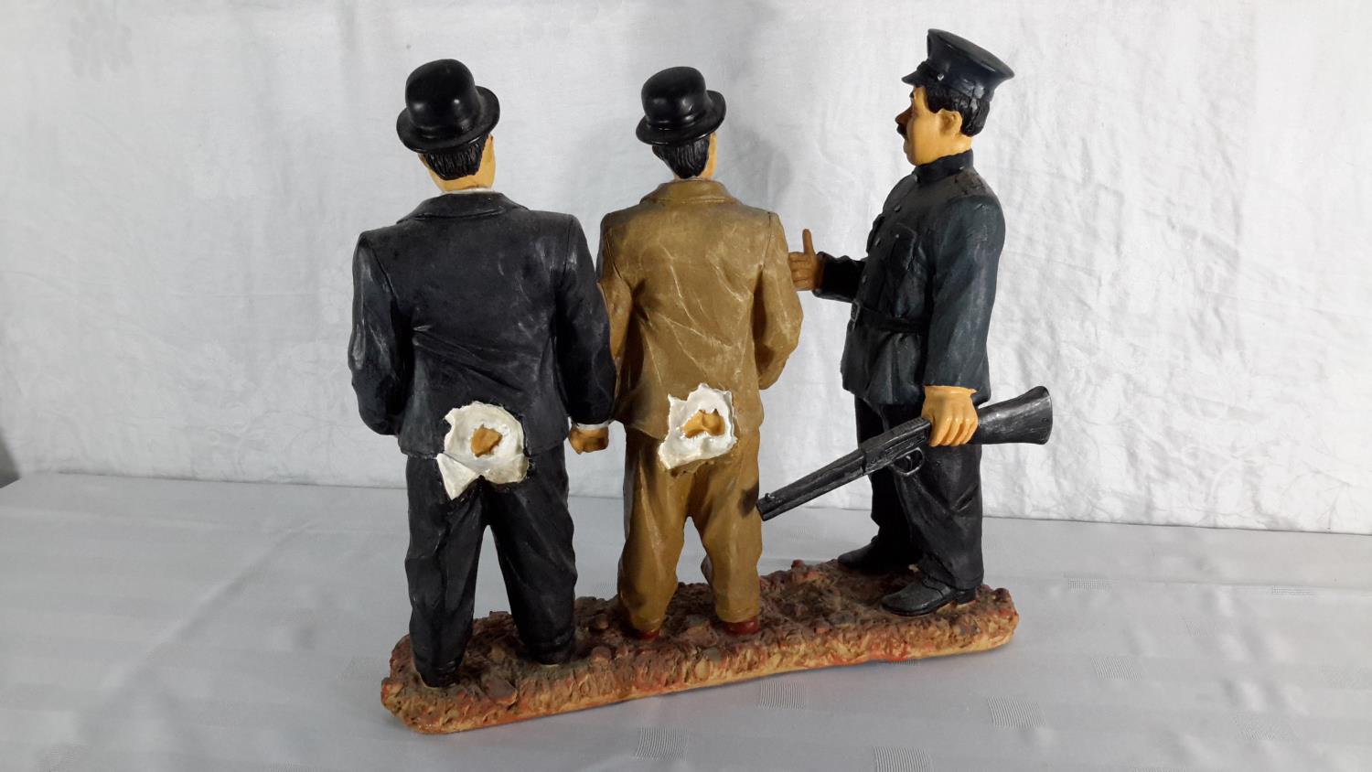 Laurel & Hardy figure with police officer. 34cm in height - Image 2 of 2