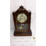 'Seth Thomas Clock Company' clock with key & pendulum pat. July 30th 1878, 50cm in length