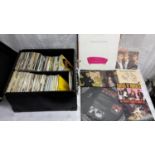 A case full of 45RPM's to include Guns n Roses, Queen, Meat Loaf & Aha etc