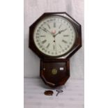 Wm L Gilbert Clock Co, 8 day regulator calendar wall clock, 57cm in length