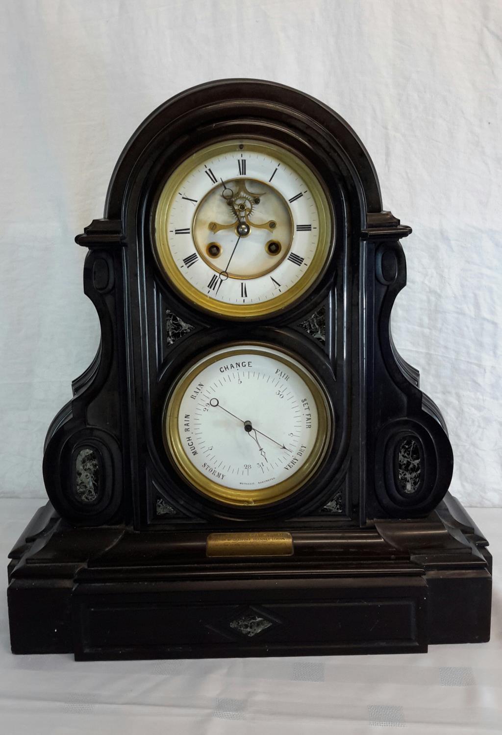 A 19th Century black marble clock, the movement stamped D.G.& Cie Paris 3419, with a striking