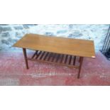 Retro teak coffee table with spindle slat shelf on pedestal legs, 47x122x51cm