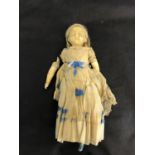 An 19th century bisque style doll (damaged)