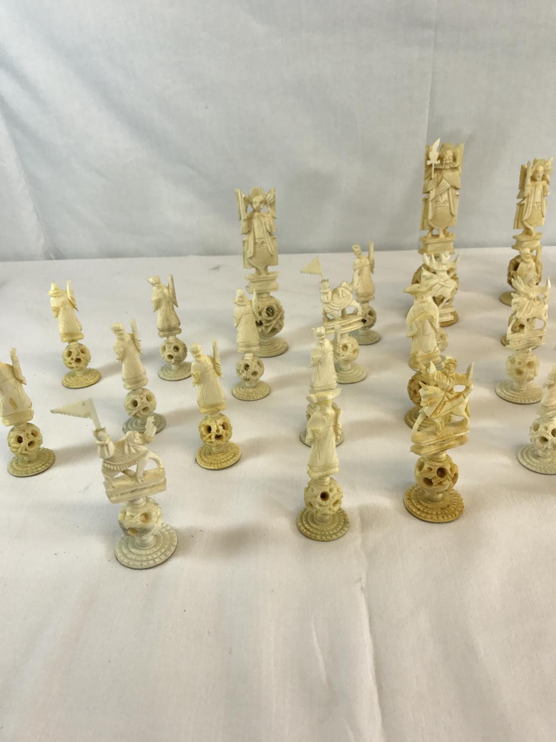 A collection of Oriental hand carved bone puzzle ball chess pieces - Image 3 of 3