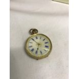 A 9ct gold pocket watch with ceramic face working order