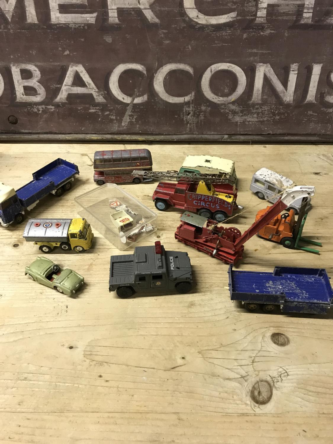 A collection of play worn dinky models etc