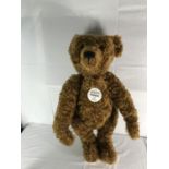 A large 70cm Steiff teddy bear (replica of the 1906 bear) comes with large box and letter)