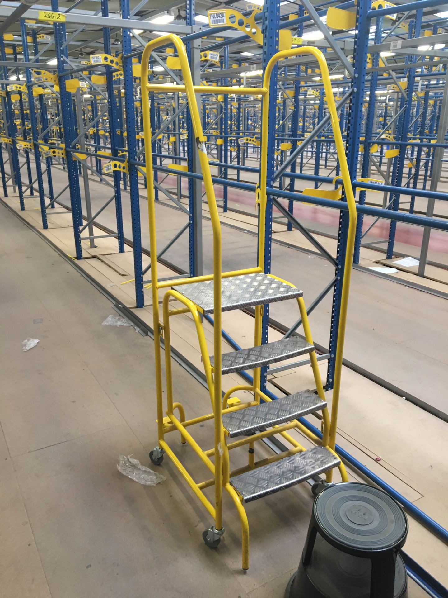 8 x Yellow metal frame library steps on castors (4 rung).