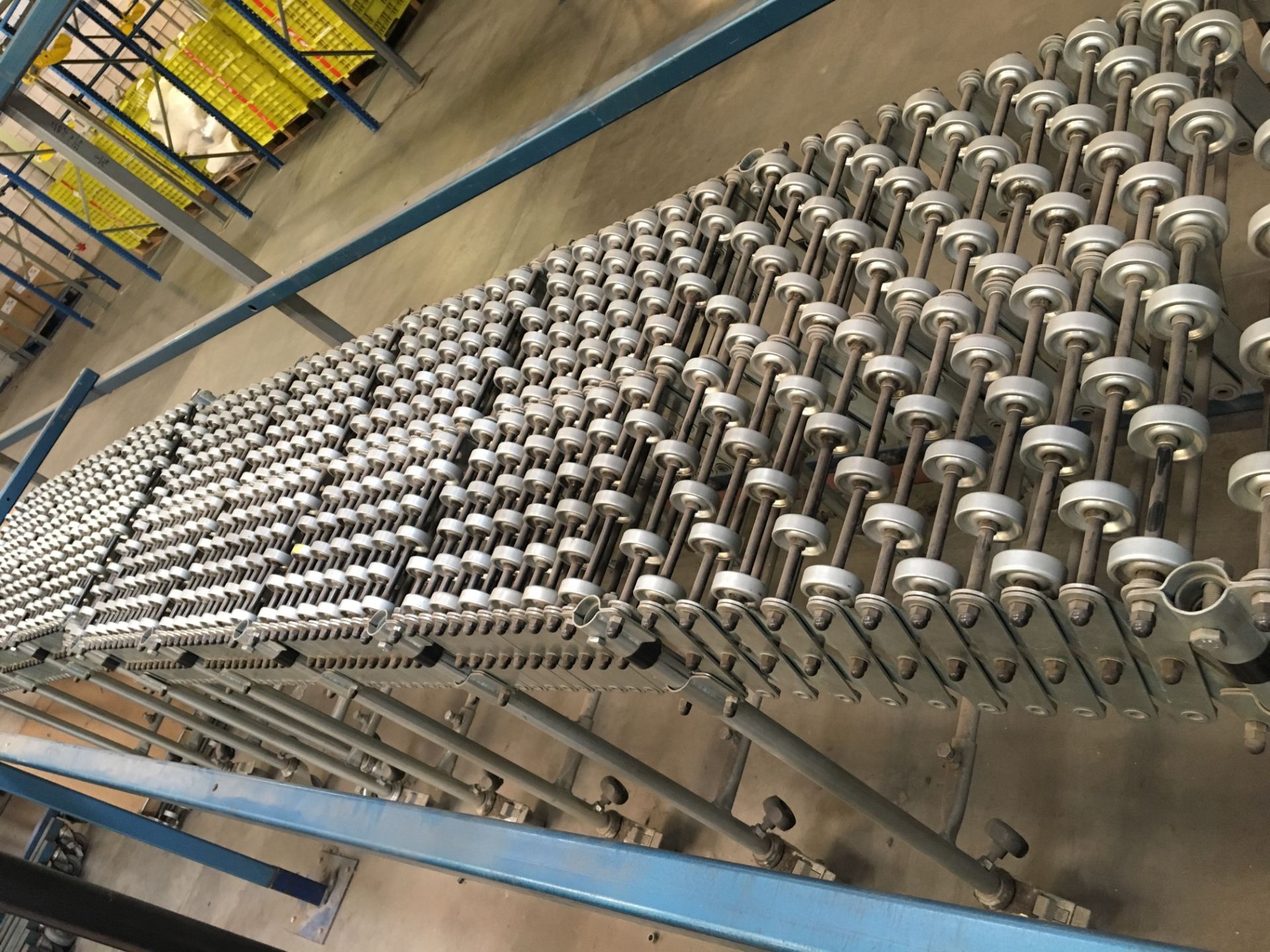 10 stage concertina roll conveyor on castors.