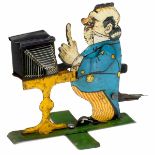 Articulated Tin Toy Photographer, 1920s Unmarked. Lithographed figure with lever mechanism for the